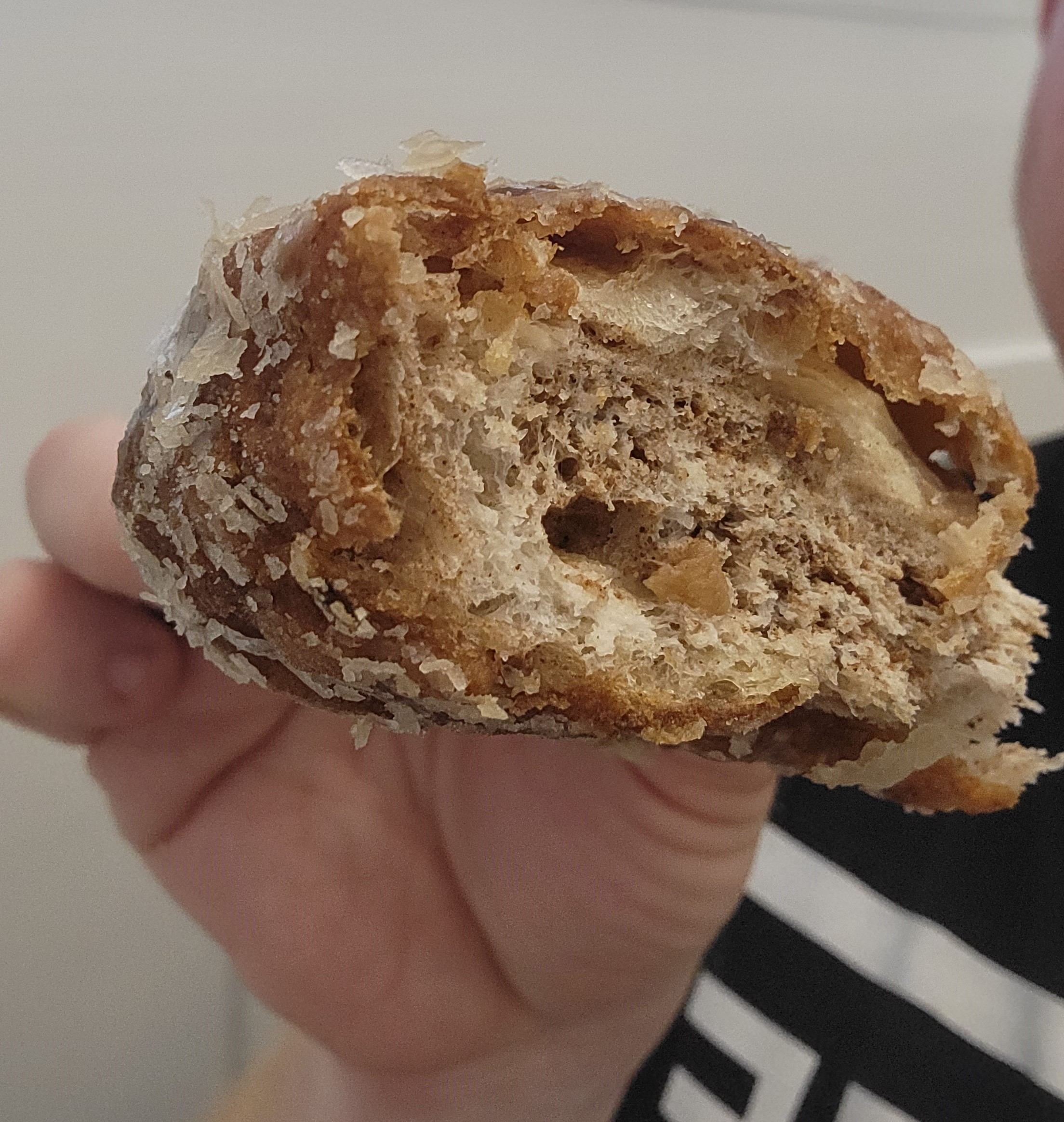 Hanks Pastries apple fritter cut in half