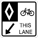 Ground-mounted sign indicating bicycle-only lane