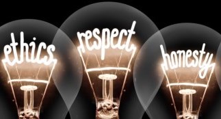 Light bulbs with lit up words "ethics" "respect" and "honesty" 