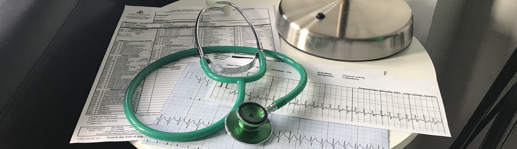 An image of a stethoscope on a desk