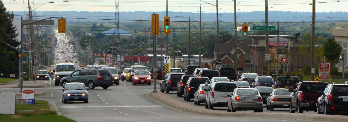 A photograph of cars on a busy road