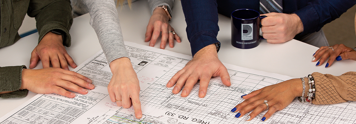 A picture of hands working at a desk