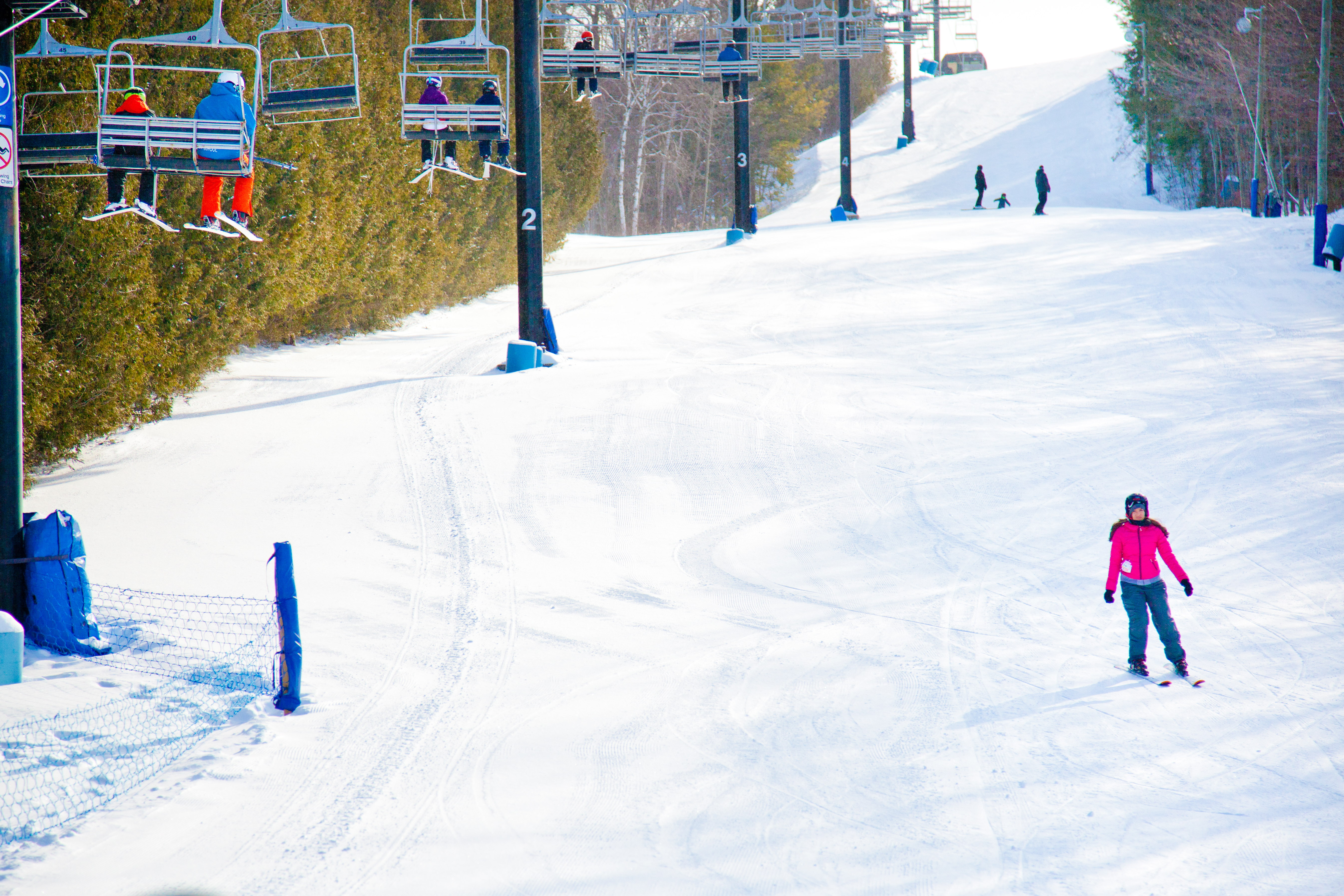 Long shot of skier going down hill at Dagmar Ski Resort