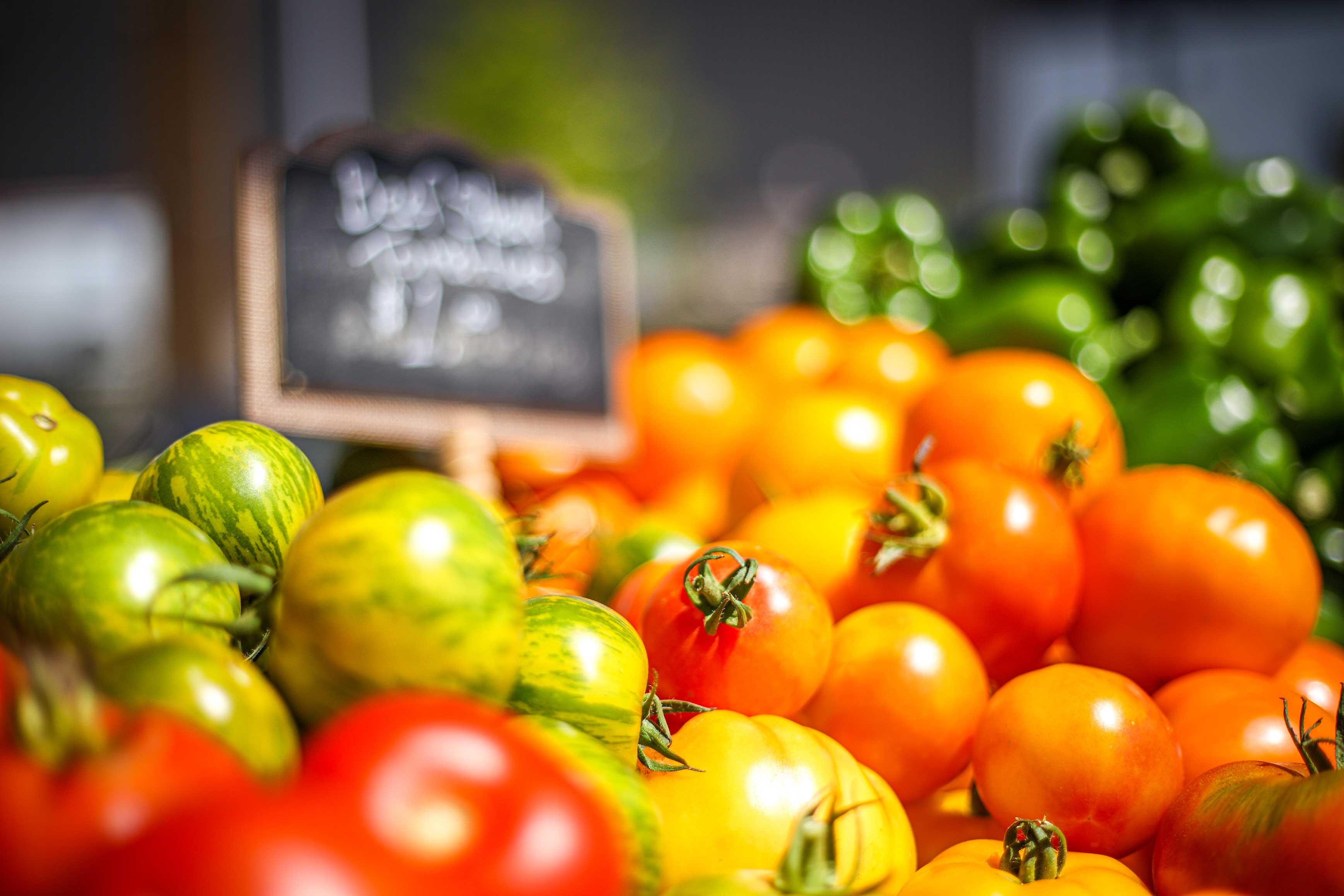 Colourful tomatoes for sale at farmers market