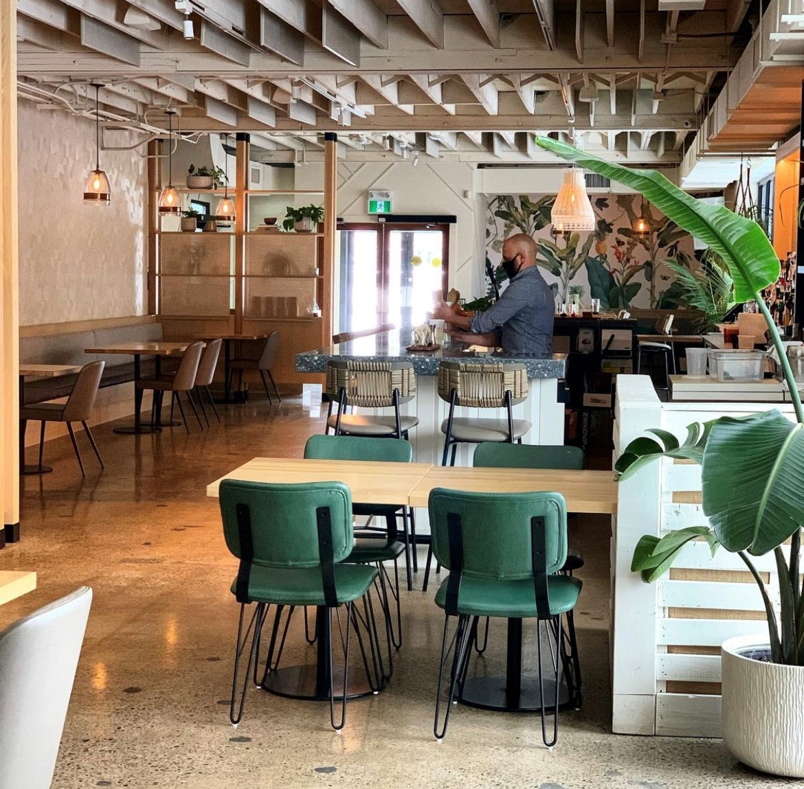 Tables and bar inside of Chuuk Restaurant in Pickering.