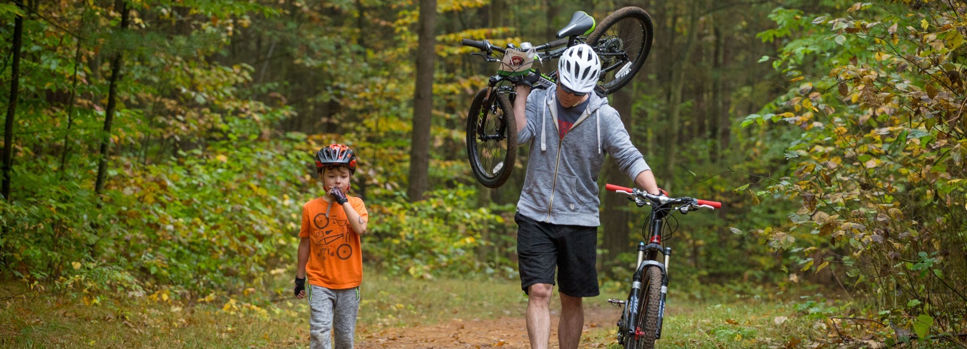 Father and son mountain biking