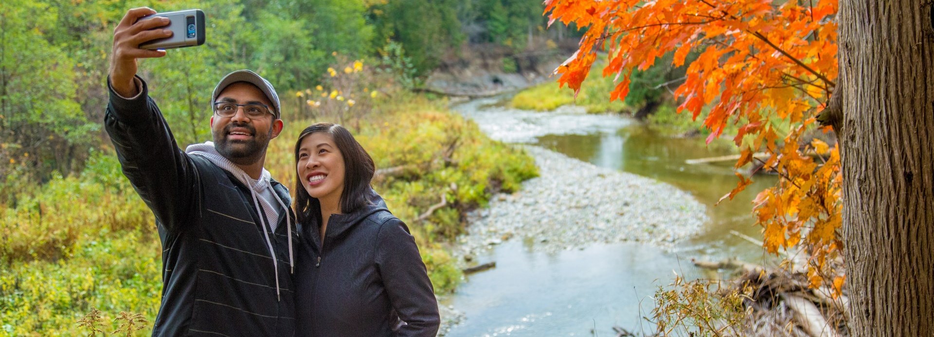 Couple taking selfie on trail