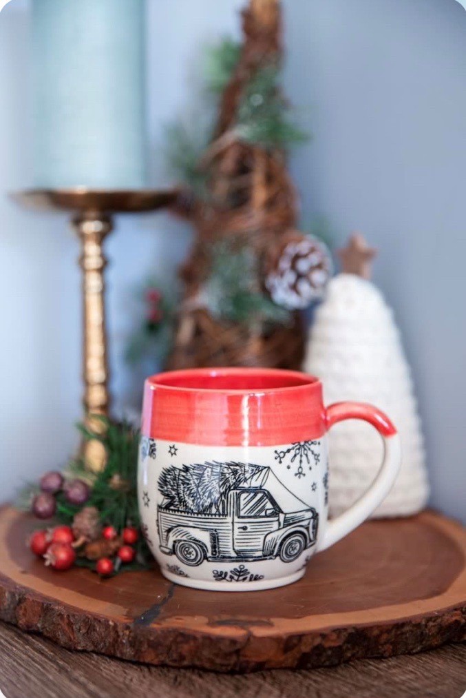 White and red porcelain mug with truck and Christmas tree drawing