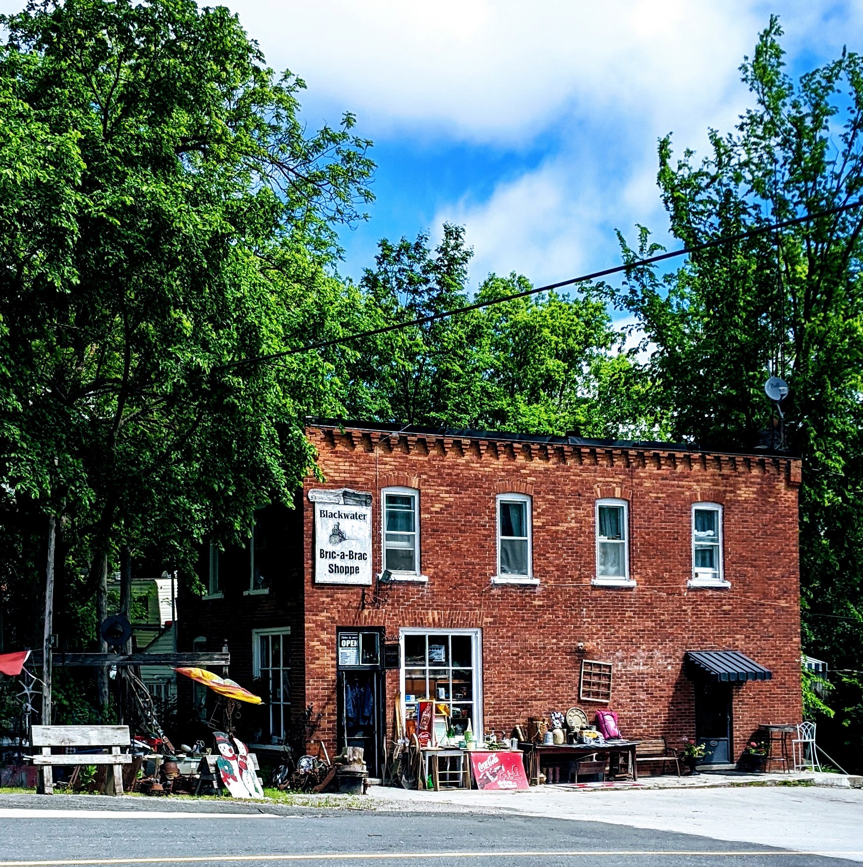 Blackwater bric-a-brac store front with antiques displayed outside
