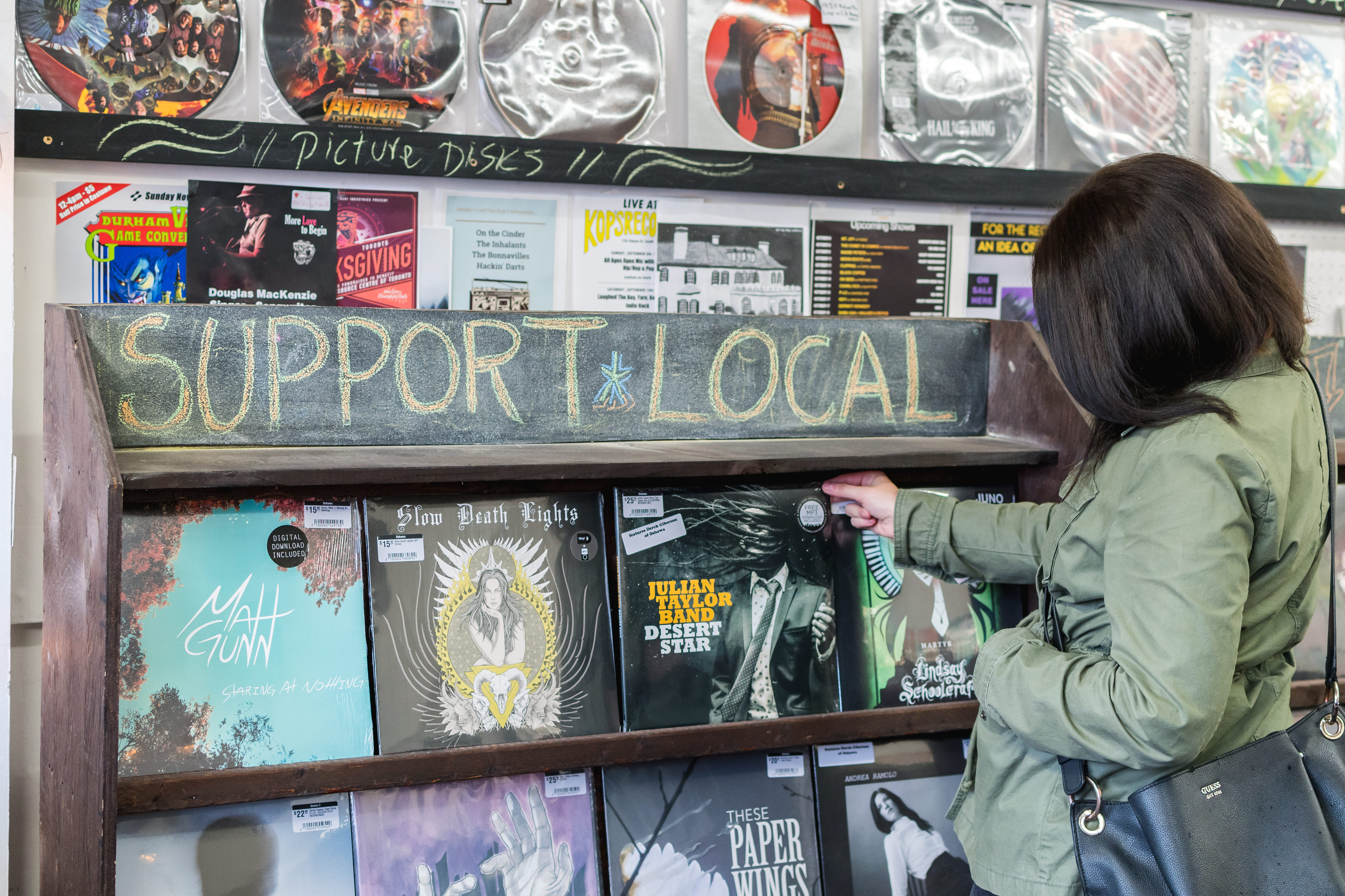 Shopper inside record store in Oshawa