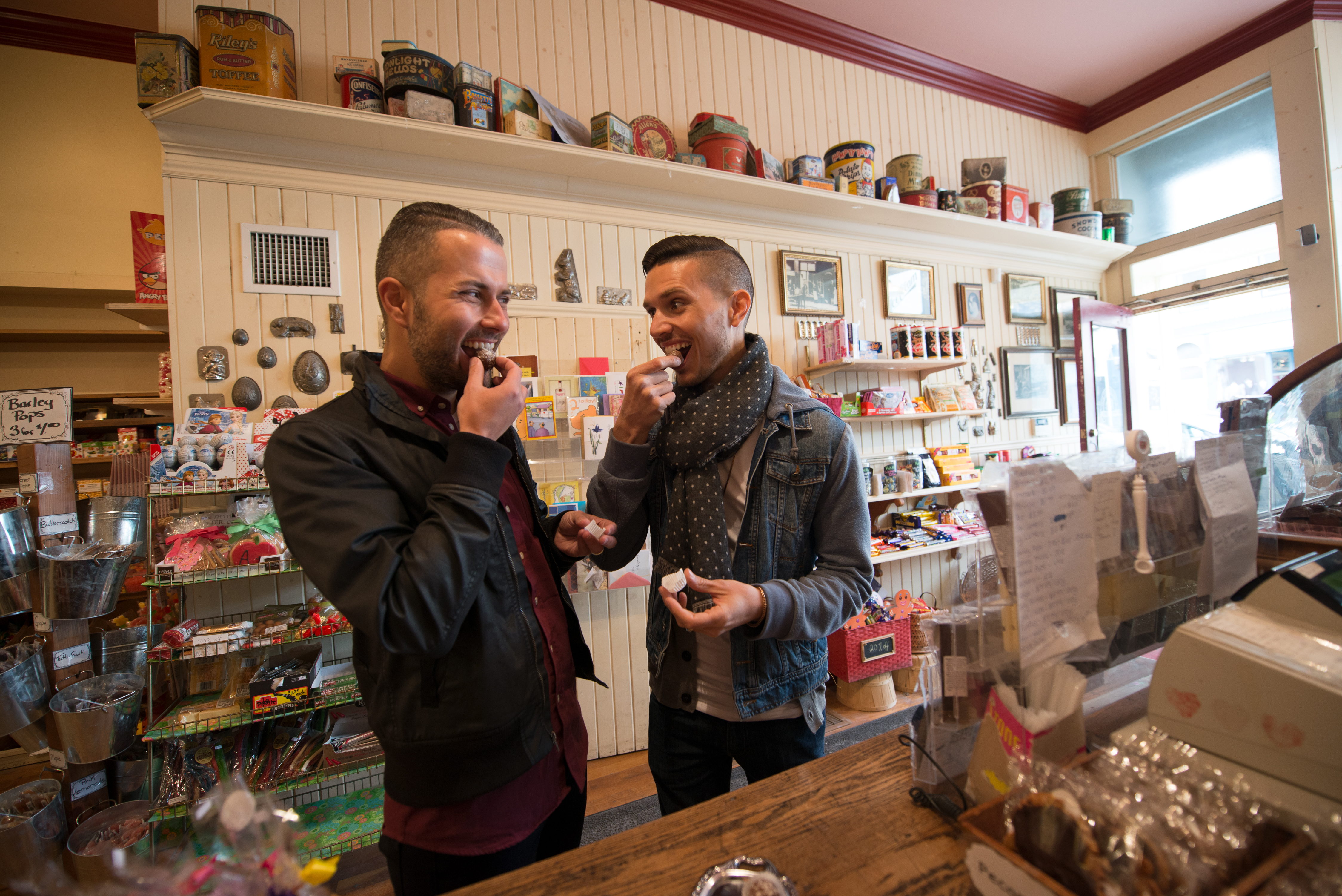 Two people tasting chocolates at the Nutty Chocolatier in Port Perry.