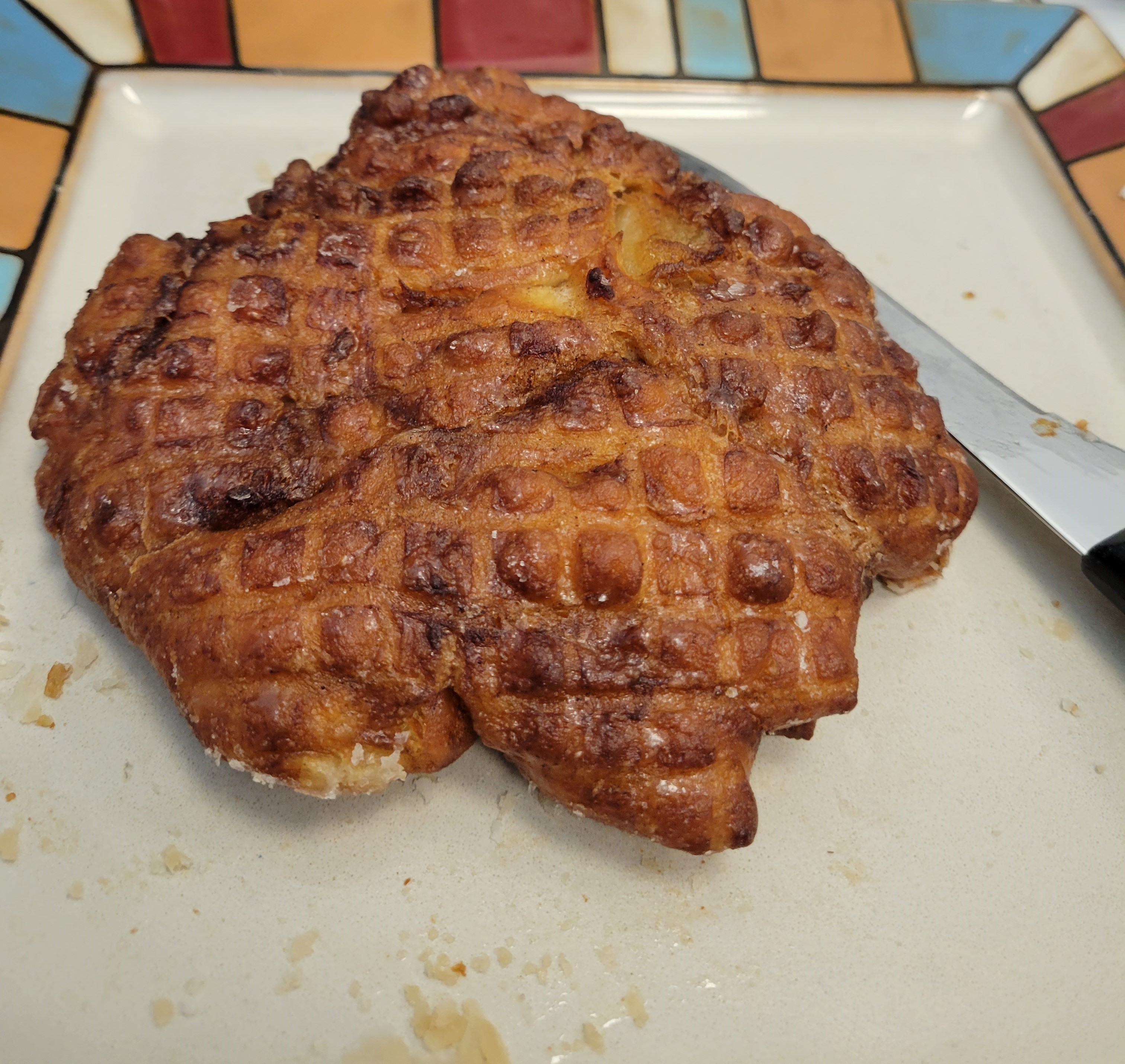 Village Bake Shop apple fritter on colourful plate