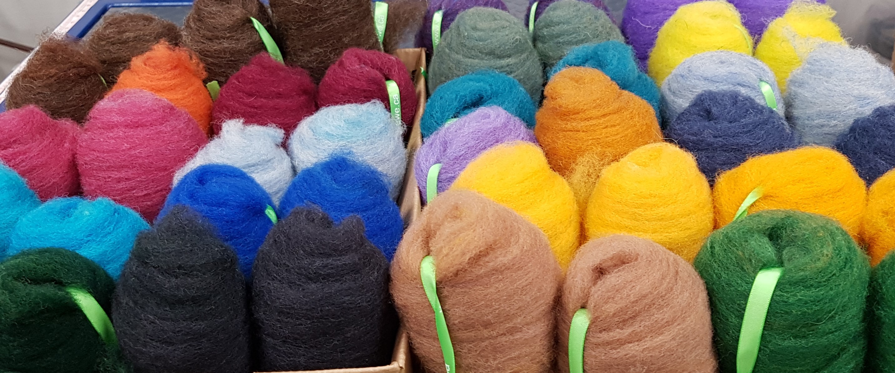 Tray of different coloured wool balls from Wool 4 Ewe