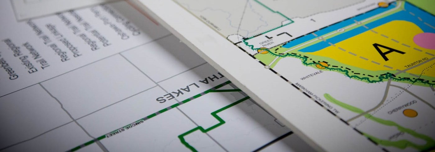 Maps of Durham Region on a table