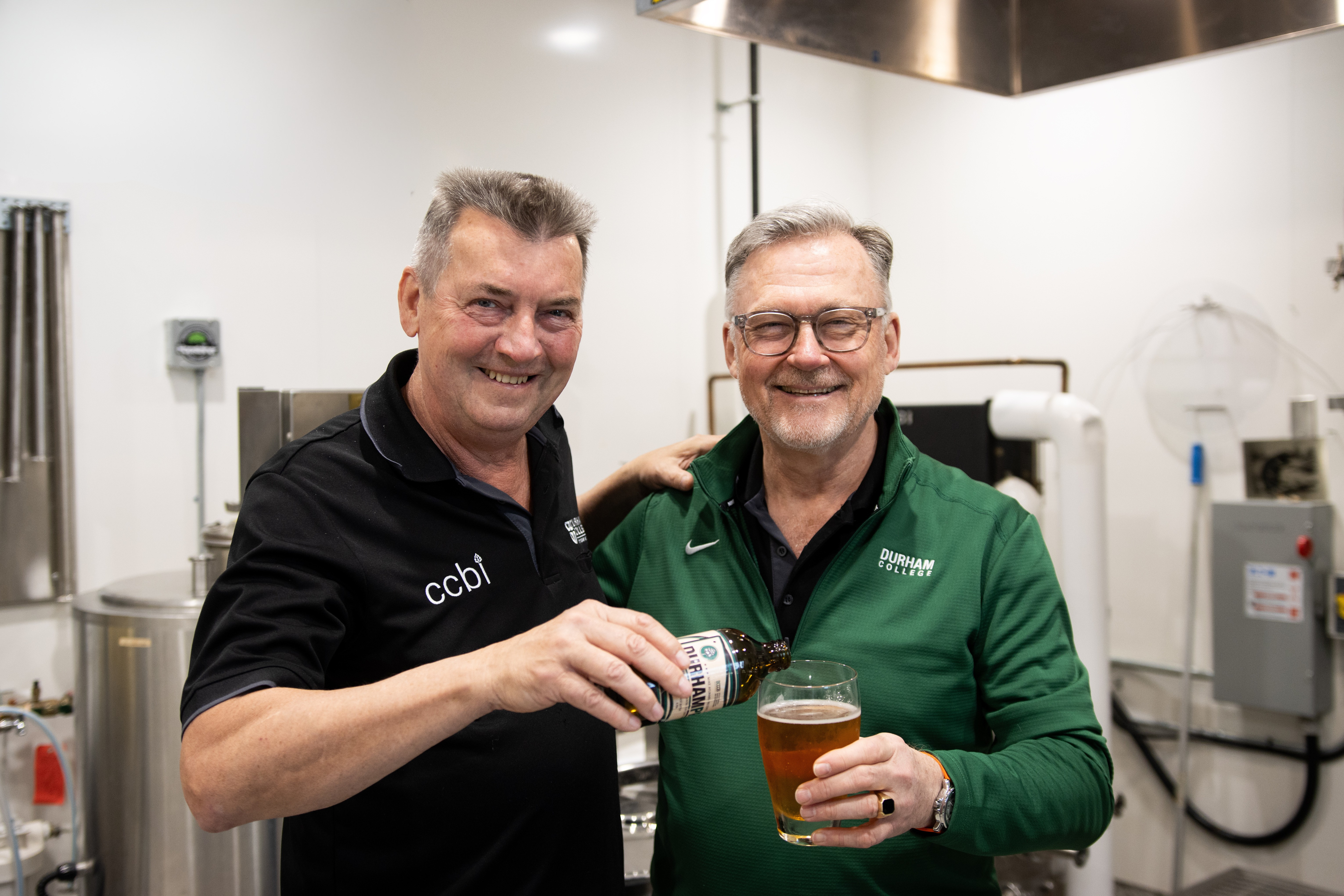 Mike and Chris pouring a beer at the Centre for Craft Beverage Innovation in Whitby, Ontario, Canada