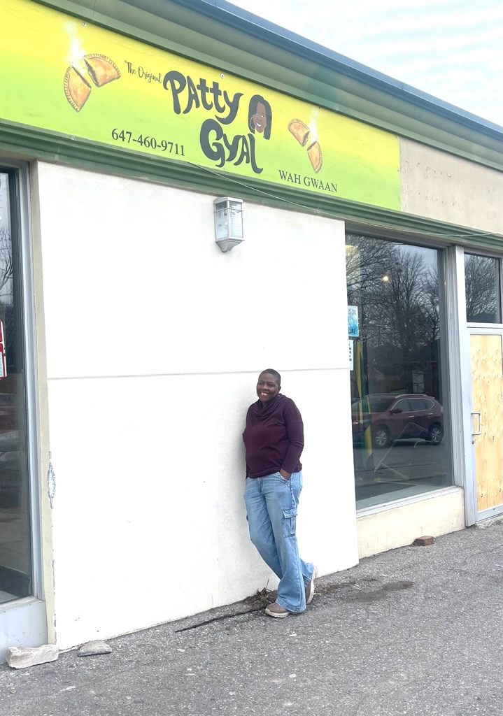 Carlene Honigan infront of her restaurant, The Original Patty Gyal