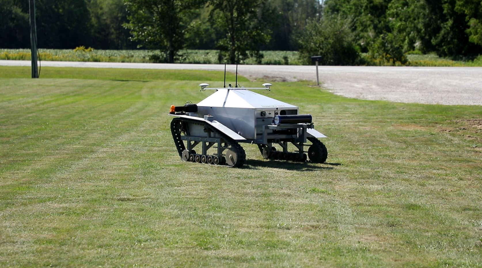 Korechi Innovations autonomous robot on a grass field.