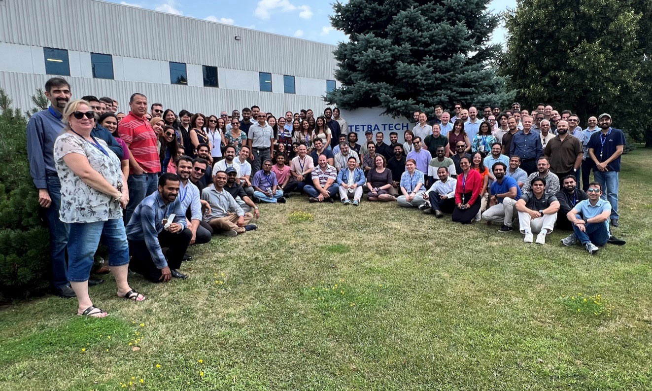 Large group shot of the Tetra Tech team outside their building in Pickering.