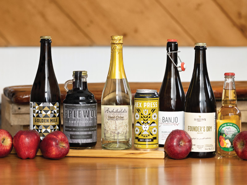 Group of apple wines and ciders from local cideries and wineries in Durham Region.
