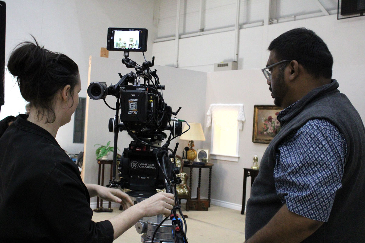 Two people using film equipment at the Film Durham Career Fair.