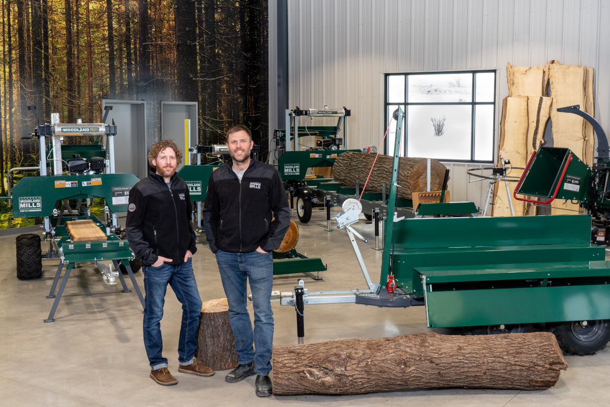 The founders of Woodland Mills standing in the showroom.