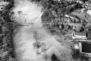 Bird's eye view of building and parking lot after a flood