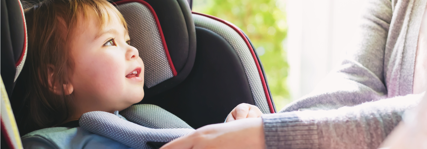 Toddler in booster seat