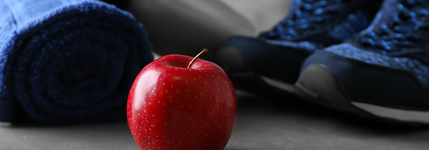 Apple, running shoes and exercise mat.