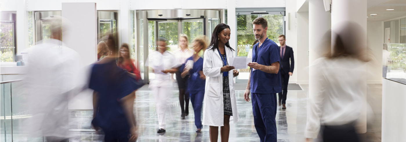 Hospital staff in lobby.