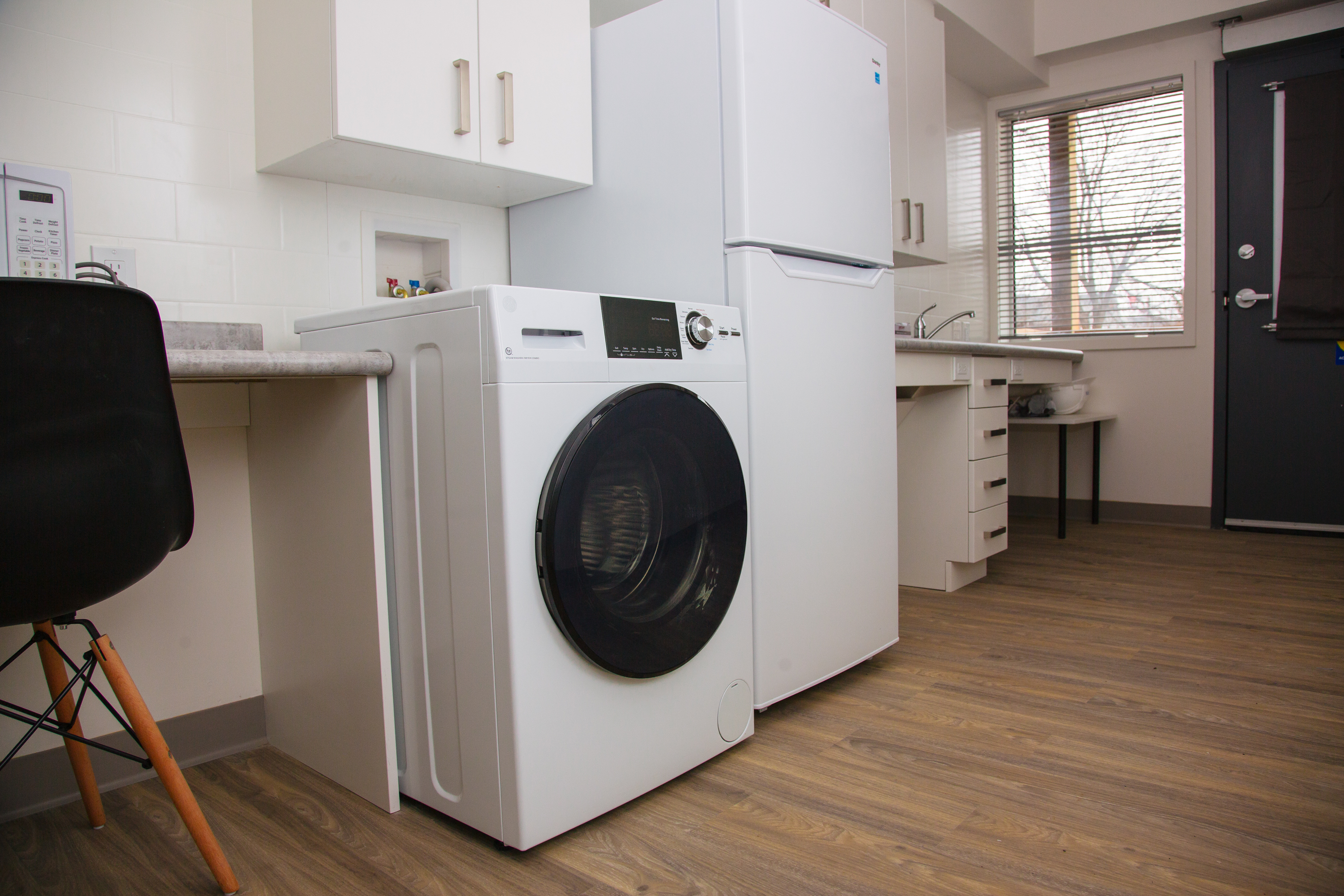 Laundry machine in accessible micro-home unit