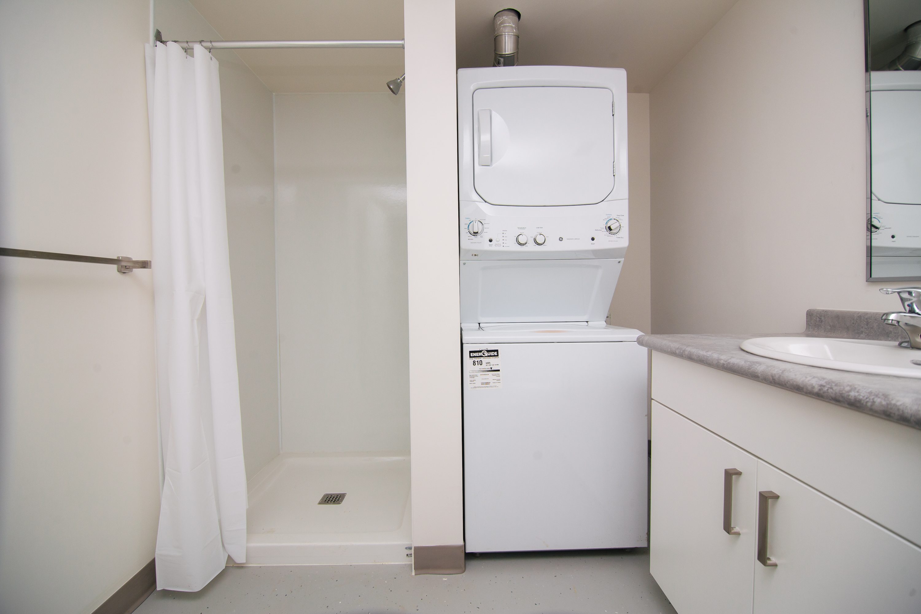 Washroom and laundry machine (washer/dryer) in micro-home unit