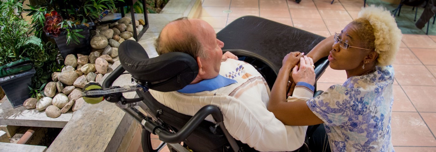 Long-term care staff with resident