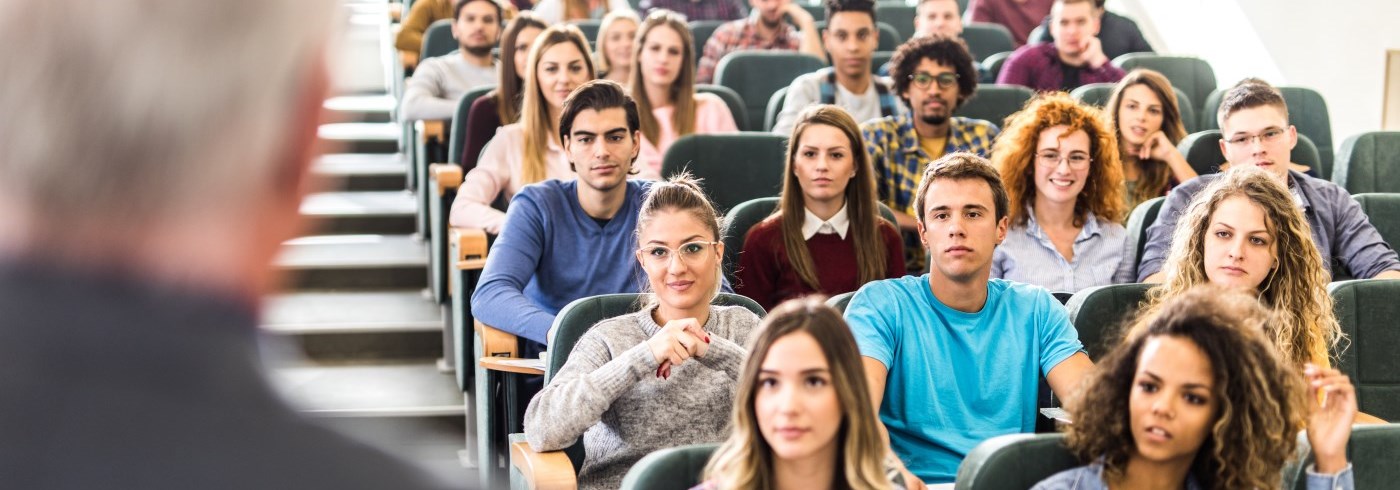 Man giving students a lecture