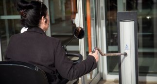 Woman using accessibility tower at Regional Headquarters