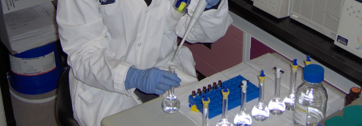 Lab technician testing water samples