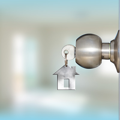 A deadbolt lock and a key