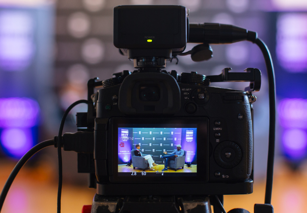 Photo of camera with camera screen displaying a DRIFF interview