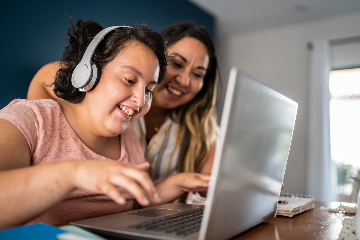 Person using computer with headset