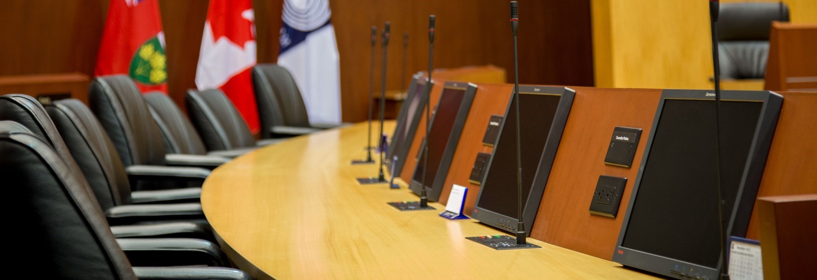 Empty seats in Council Chambers