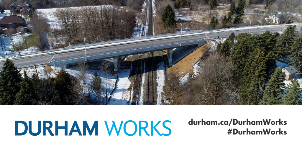An aerial view of the Cochrane Street Bridge in the Town of Whitby. Text below states: Durham Works, durham.ca/DurhamWorks #DurhamWorks. 