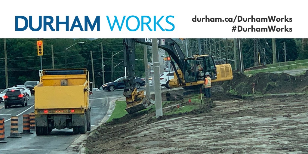 Image of a road construction project. Text over image states: “Durham Works, durham.ca/DurhamWorks #DurhamWorks.”