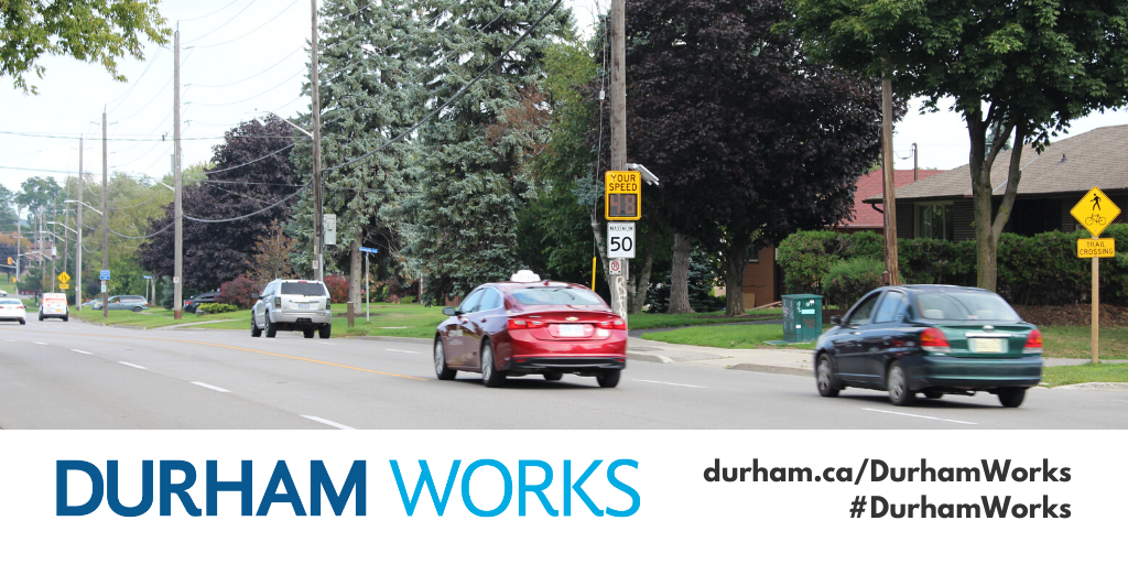Image shows vehicles driving on road and passing a speed radar feedback sign. Text under image states: “Durham Works, durham.ca/DurhamWorks #DurhamWorks.”