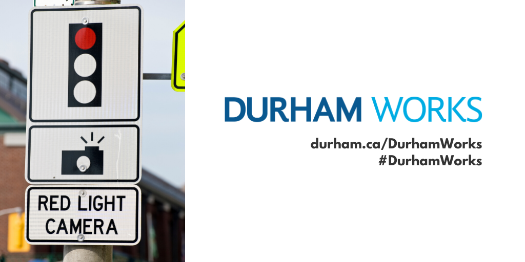 Image shows a red light camera sign. Text next to image states: “Durham Works, durham.ca/DurhamWorks #DurhamWorks.”