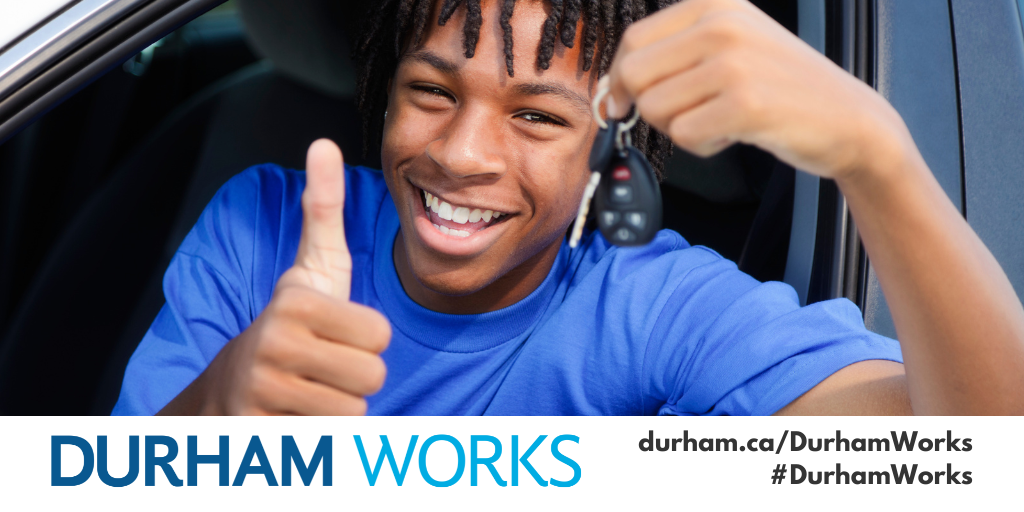 Image shows a teen giving a thumbs up and holding a set of keys out a car window. Text under image states: “Durham Works, durham.ca/DurhamWorks #DurhamWorks.”