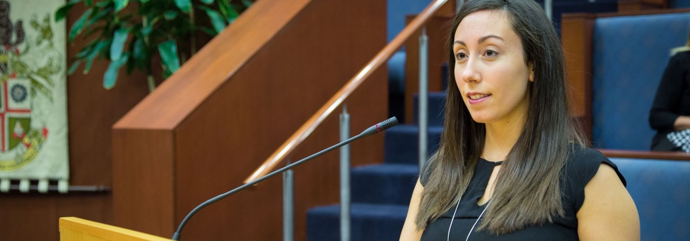 Woman speaking at Regional Council podium