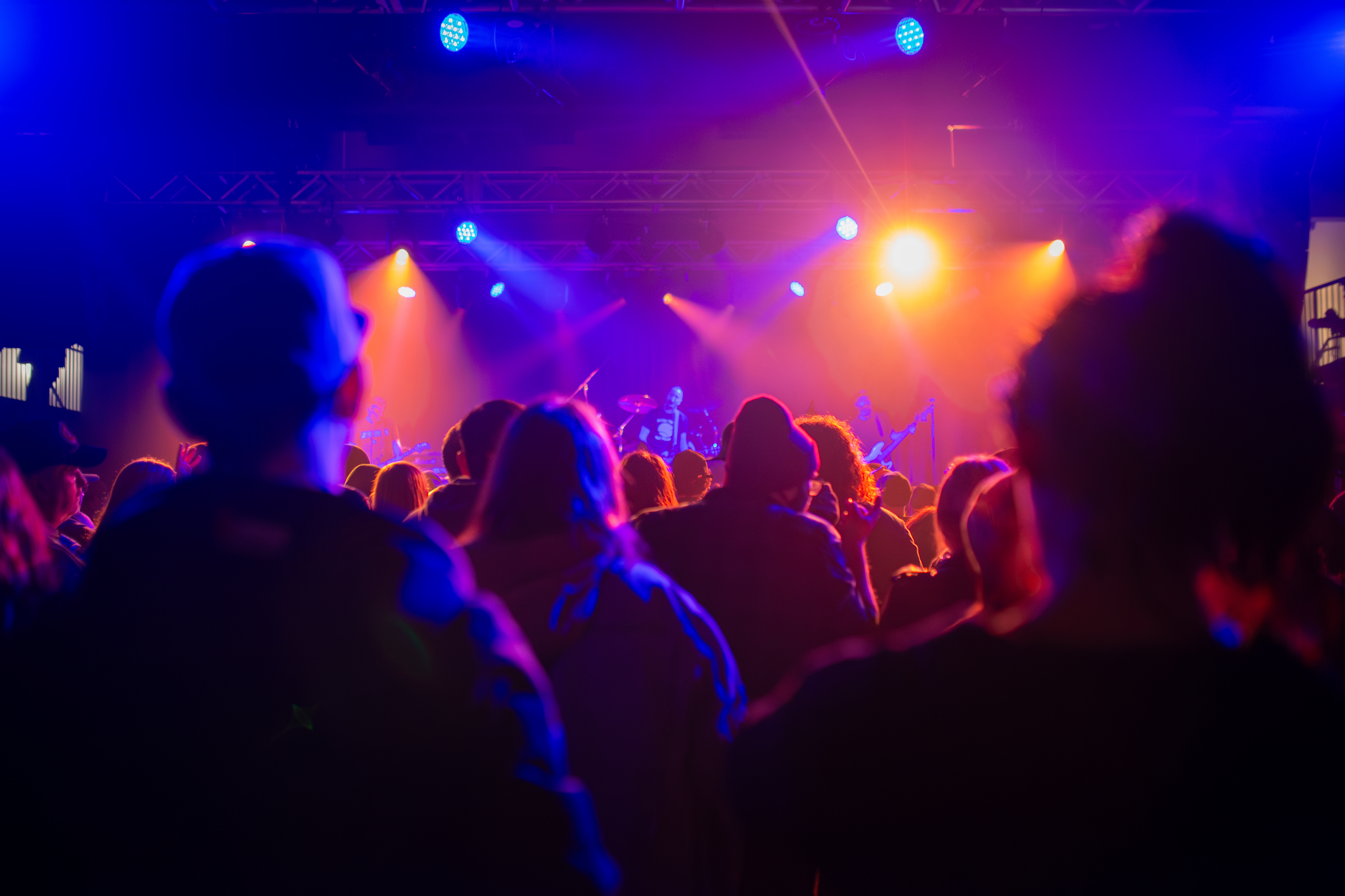 View of a stage from the perspective of the crowd.