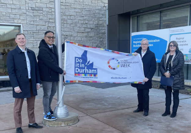 Flag raising for Do It In Durham Week 2024, Simon Gill, Sterling Lee, Chair John Henry and Teresa Shaver