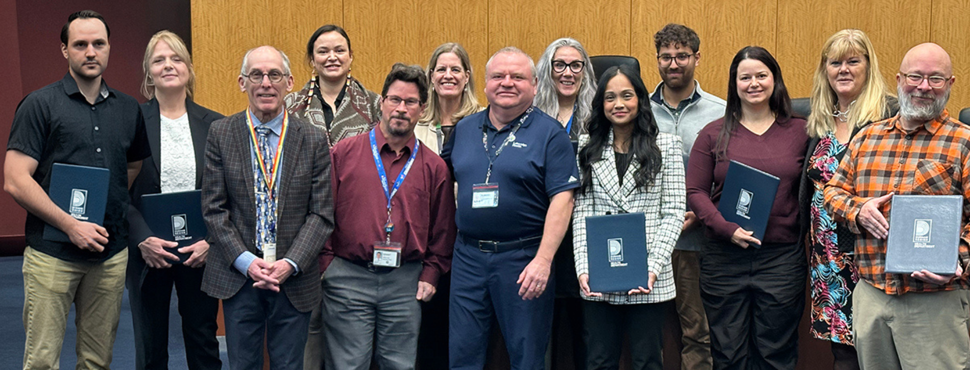 A group picture of award recipients in Regional Council Chambers.