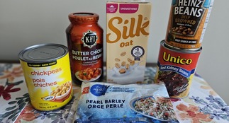 Various food donations on display on a table.