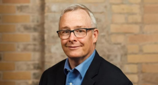 A head shot of Regional Chair and CEO John Henry.